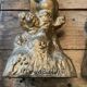 2 Seated satyr sculptures in cast bronze