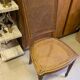 Chair with caned seat and back made of wood