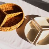 Compartment dish for appetizers, made of porcelain with a wicker support.