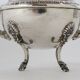Silver sugar bowl with paw feet and ornate handles