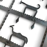 French brutalist coffee table, forged wrought iron, shepherd with dog and his herd, 1970s, transparent glass top