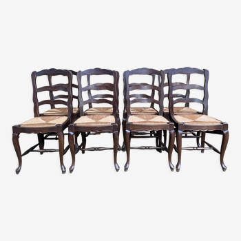 Suite of 8 rustic mulched chairs with crisscross