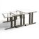 Nest of tables in chrome steel, space age style.