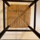 High stool made of wood and straw