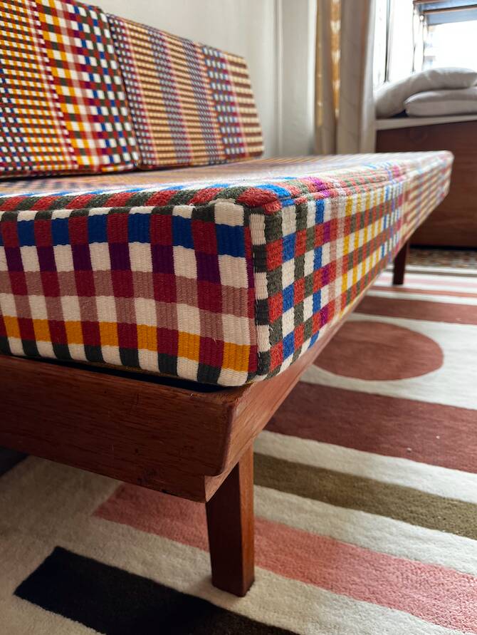 Peter Hvidt Knoll wooden banquette sofa with new cushions.