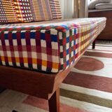 Peter Hvidt Knoll wooden banquette sofa with new cushions.