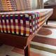 Peter Hvidt Knoll wooden banquette sofa with new cushions.