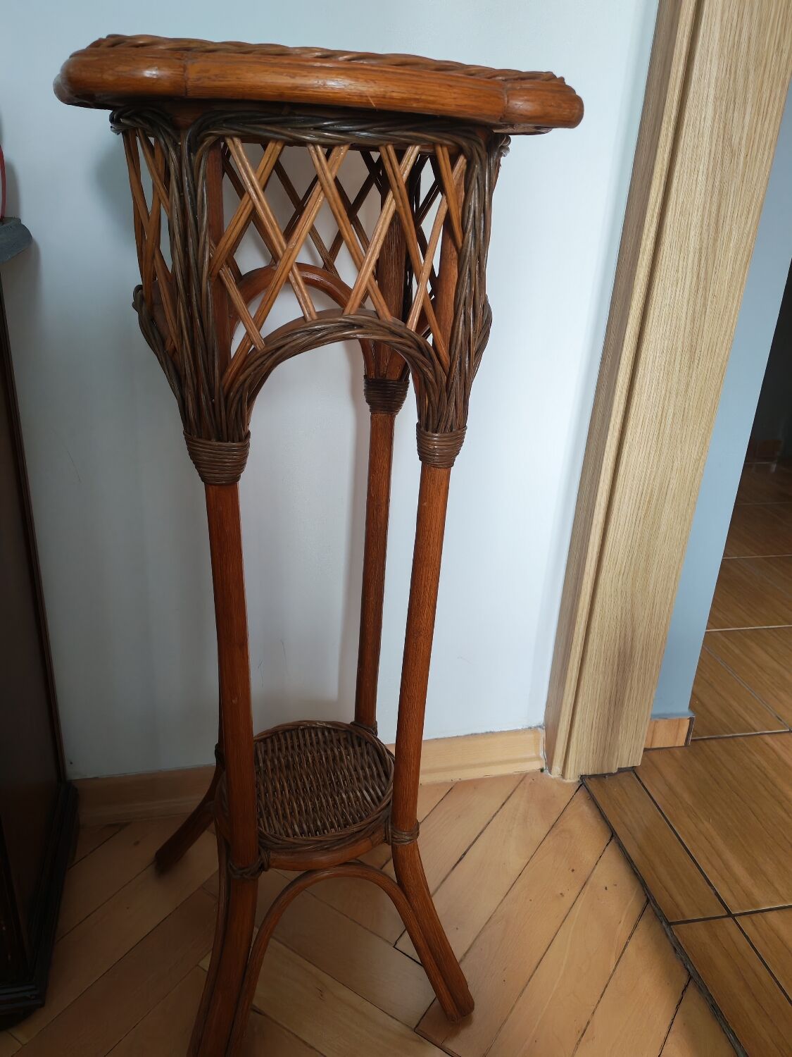 Woven wood and rattan plant stand
