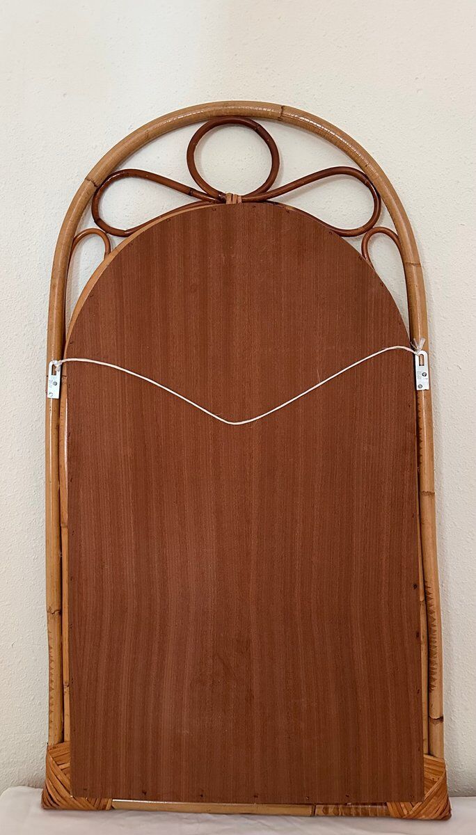Arched Spanish wall mirror in rattan and bamboo, 1960s.