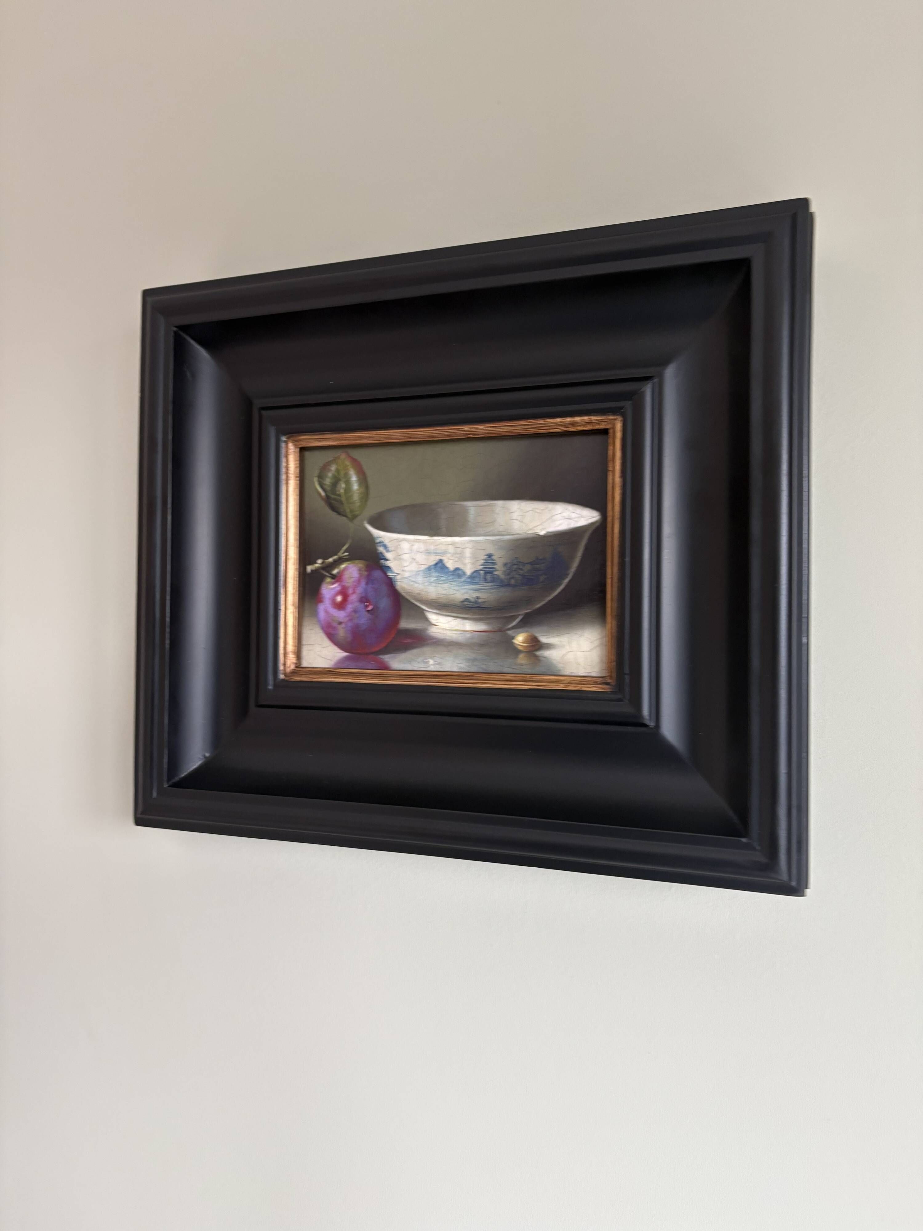 Beautiful still life with plum and bowl.