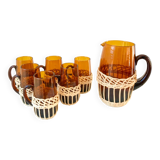 set of carafe and 6 cups in amber glass with wicker from the 70s