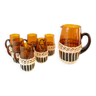 set of carafe and 6 cups in amber glass with wicker from the 70s