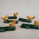 Lot de 5 porte-couteaux en barbotine oiseaux