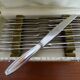 24 Art Deco style stainless steel knives - 12 desserts and 12 cheeses - In boxes
