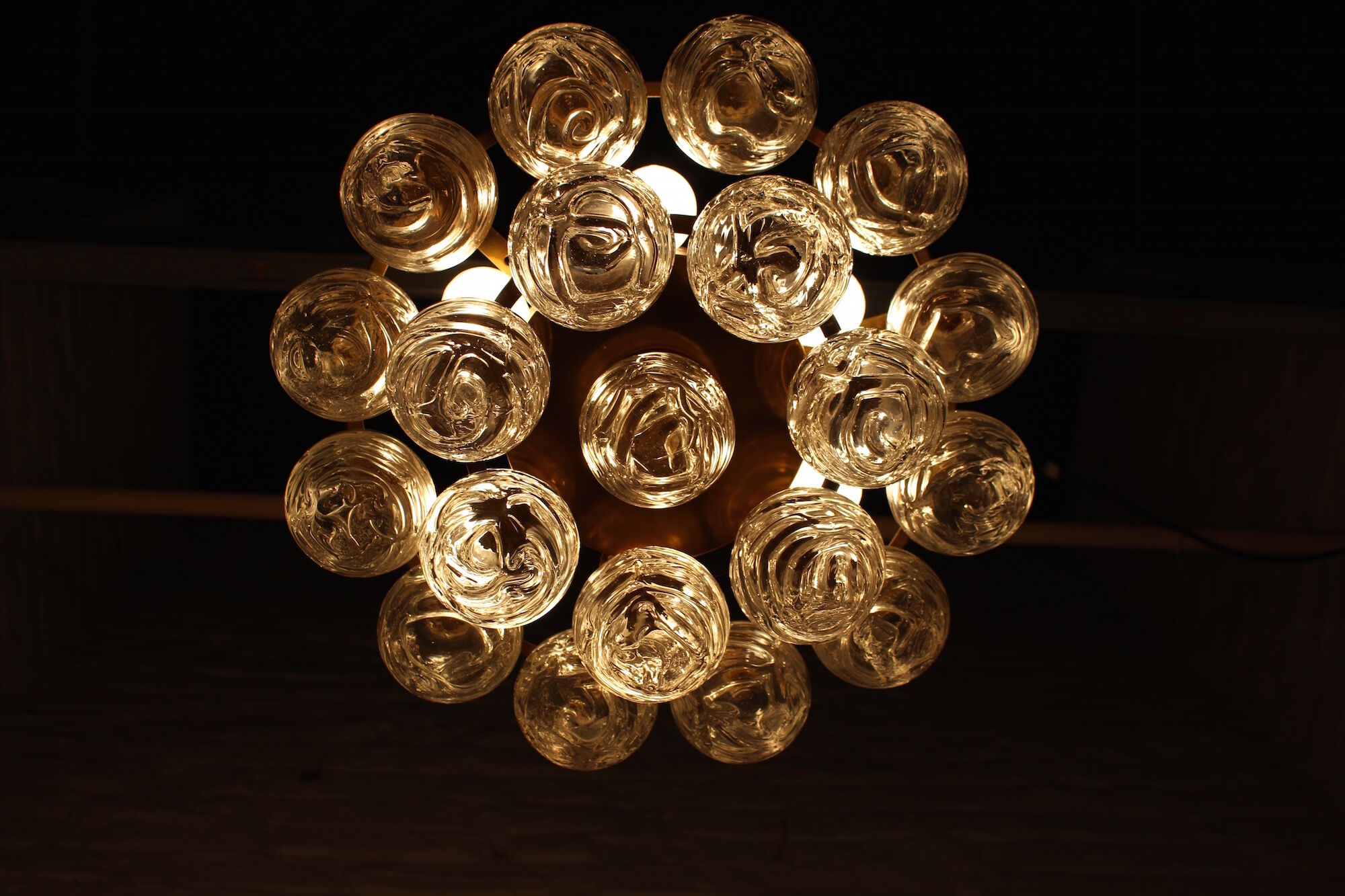 Brass chandelier and glass globes