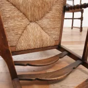 Pair of English oak armchairs with ladder back and rush seats