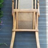 Folding beech cane armchair
