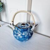 Handcrafted Japanese porcelain teapot hand painted in blue and white.
