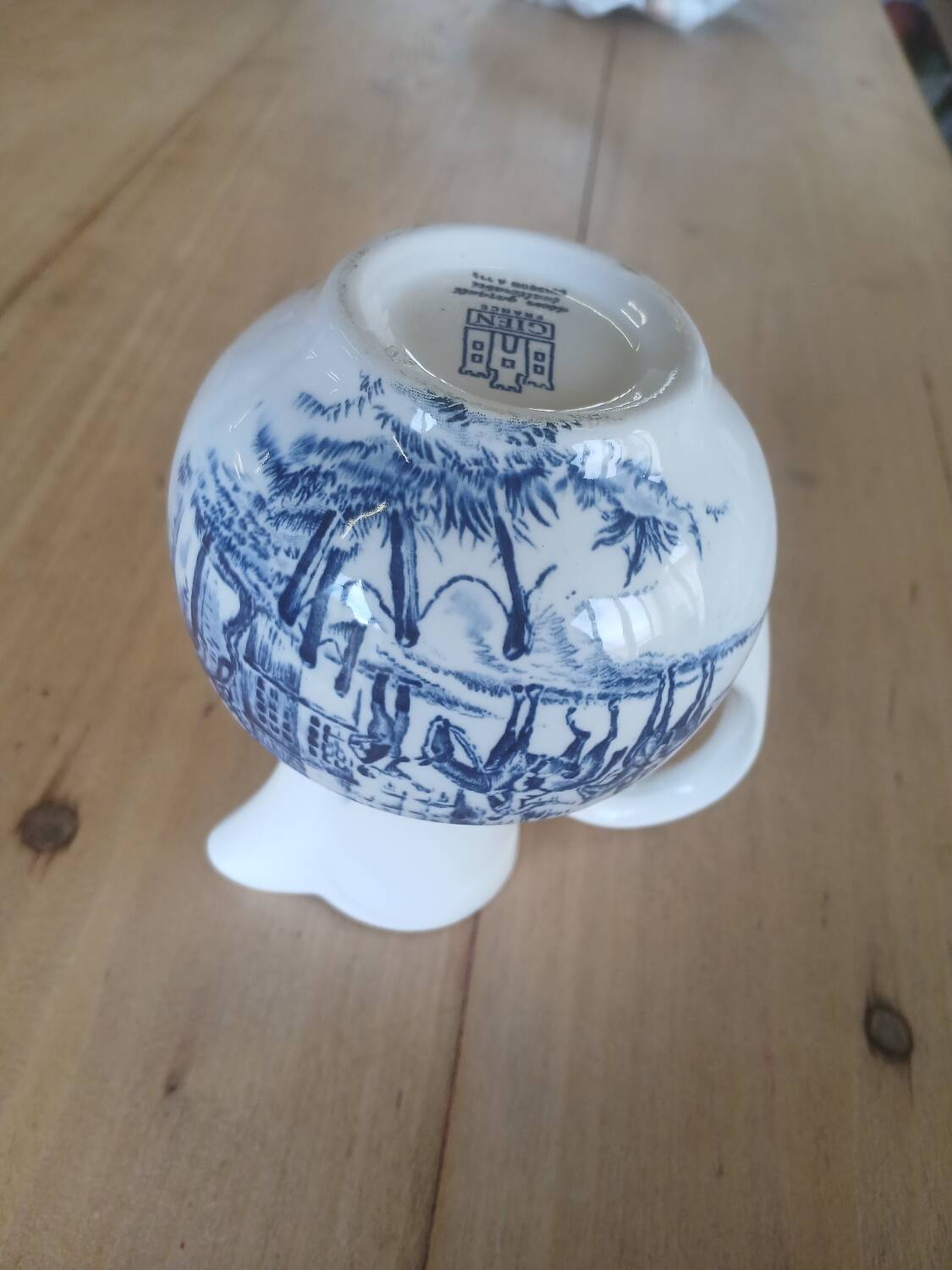 Small old pitcher in iron earth