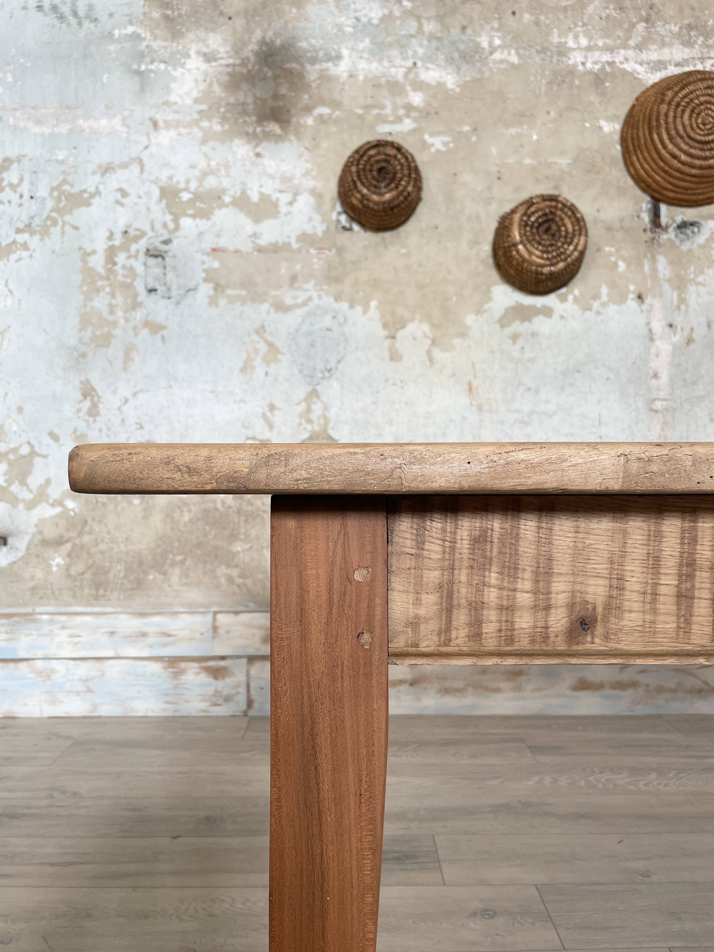 Vintage farm table with spindle legs.