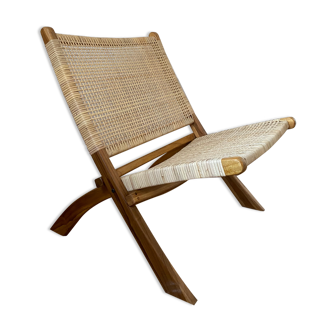 Folding armchair in wood and rattan