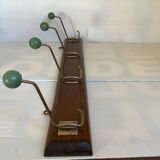 Old coat rack green balls wood metal