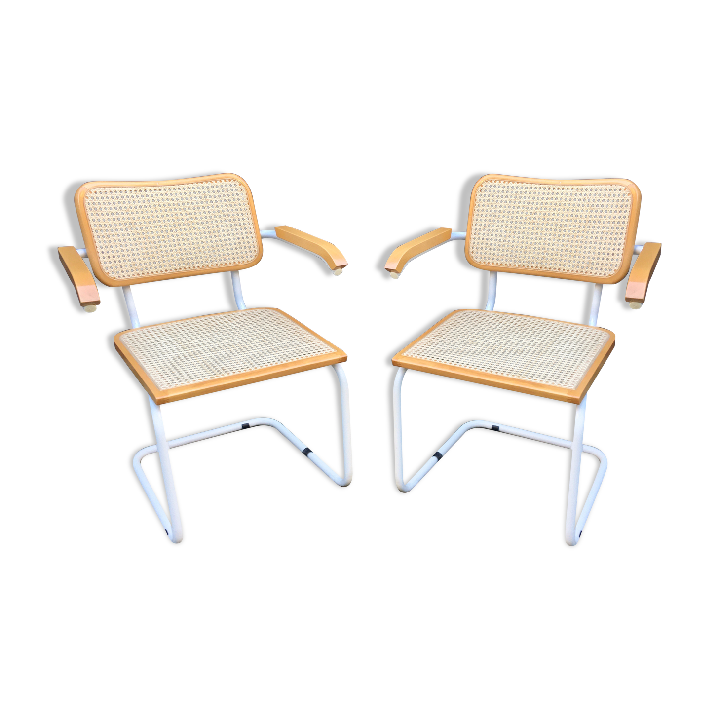 Marcel Breuer's white S64 armchairs