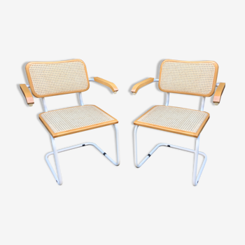 Marcel Breuer's white S64 armchairs
