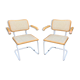 Marcel Breuer's white S64 armchairs