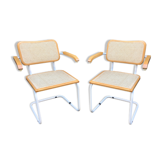 Marcel Breuer's white S64 armchairs