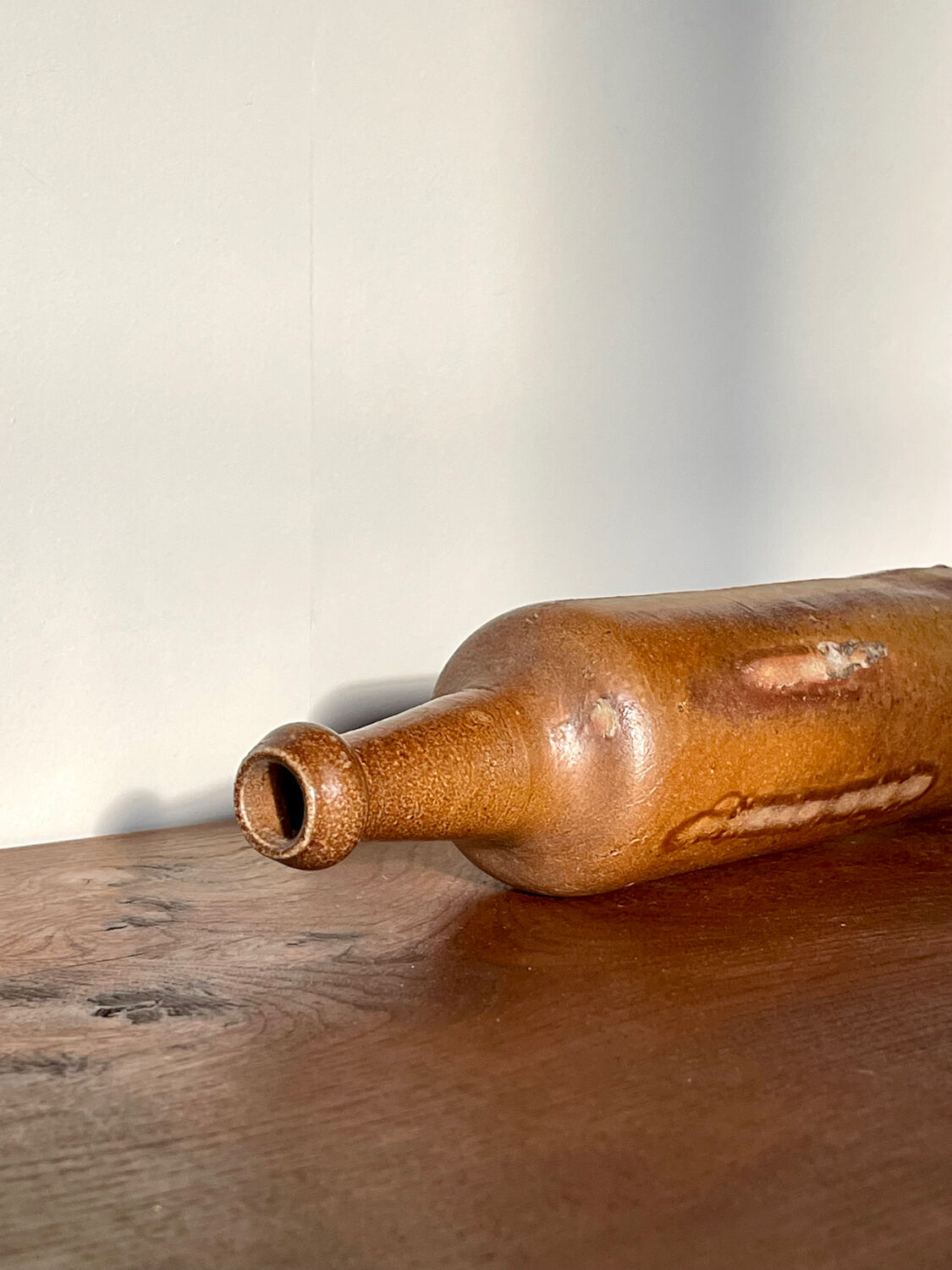 Antique stoneware bottle, 19th century.