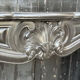 Louis XV style fireplace in black Belgian marble, circa 1880.