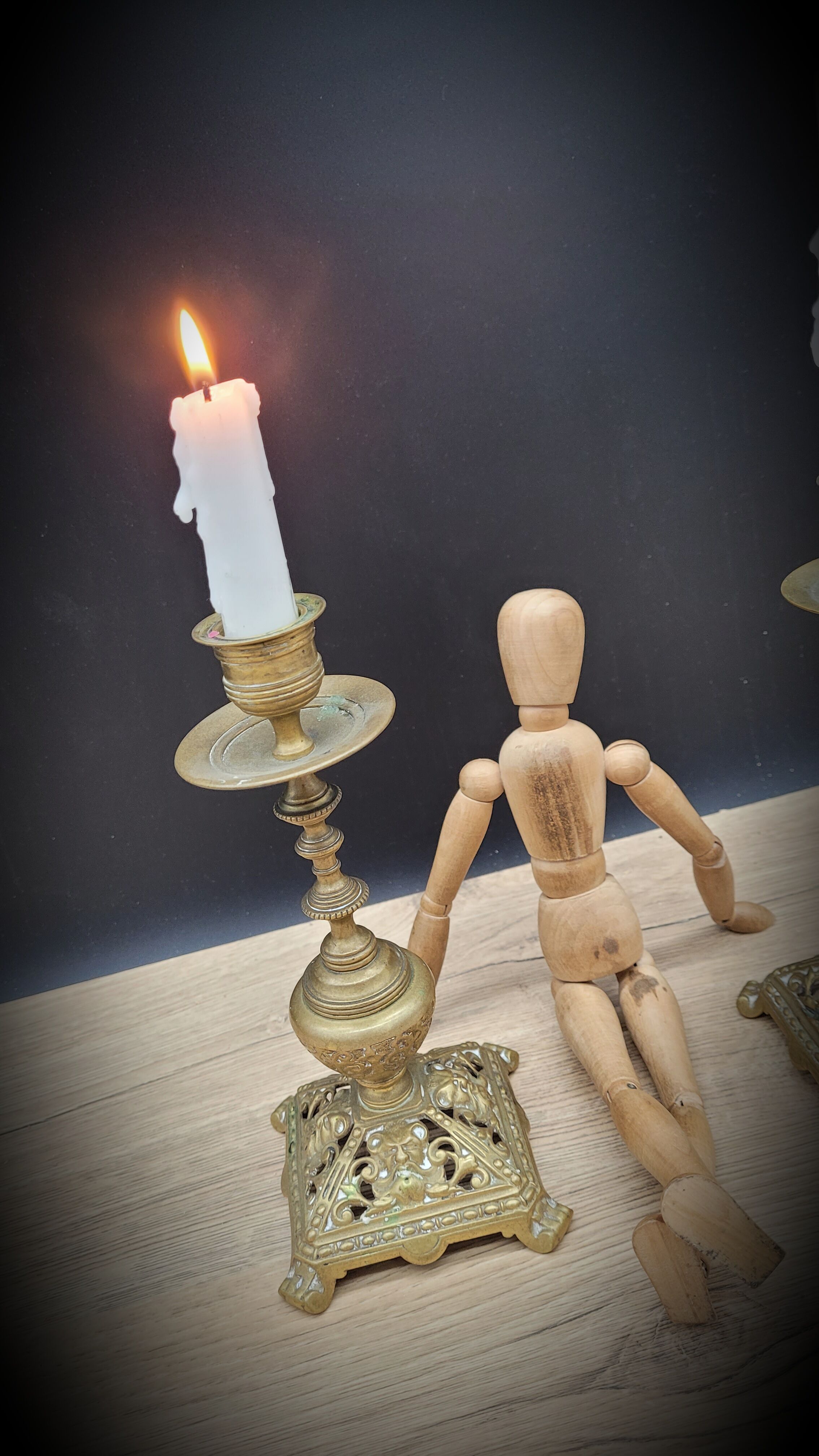 Duo worked brass candle holders