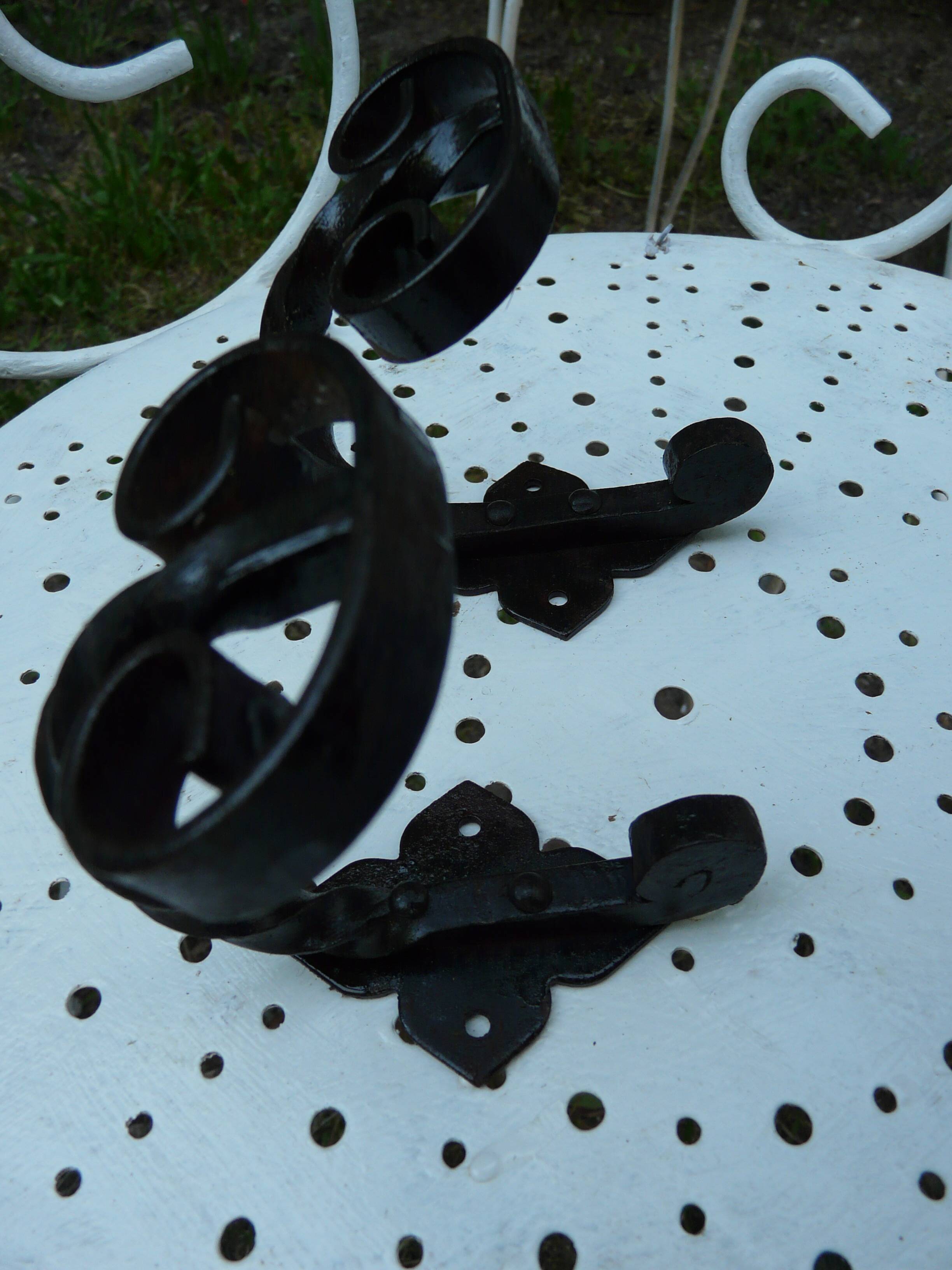 Pair of wrought iron wall hooks