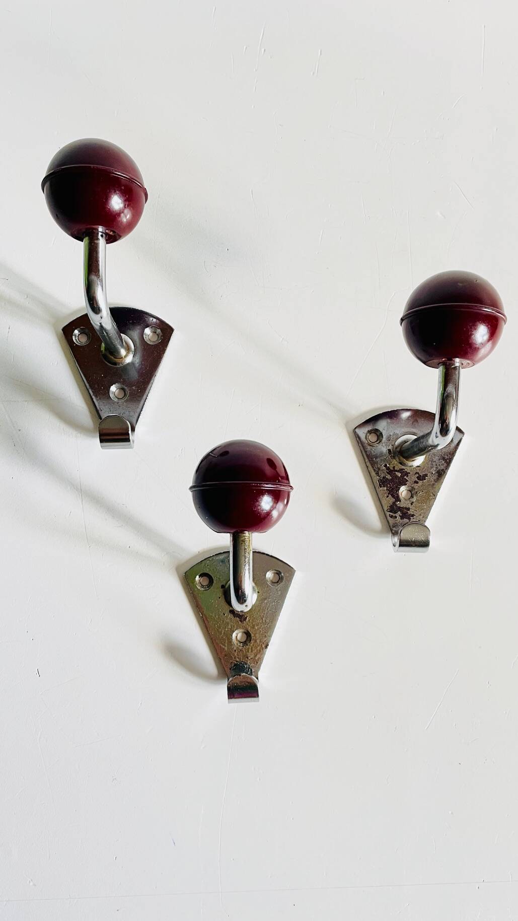Chrome and bakelite coat hooks from the 70s