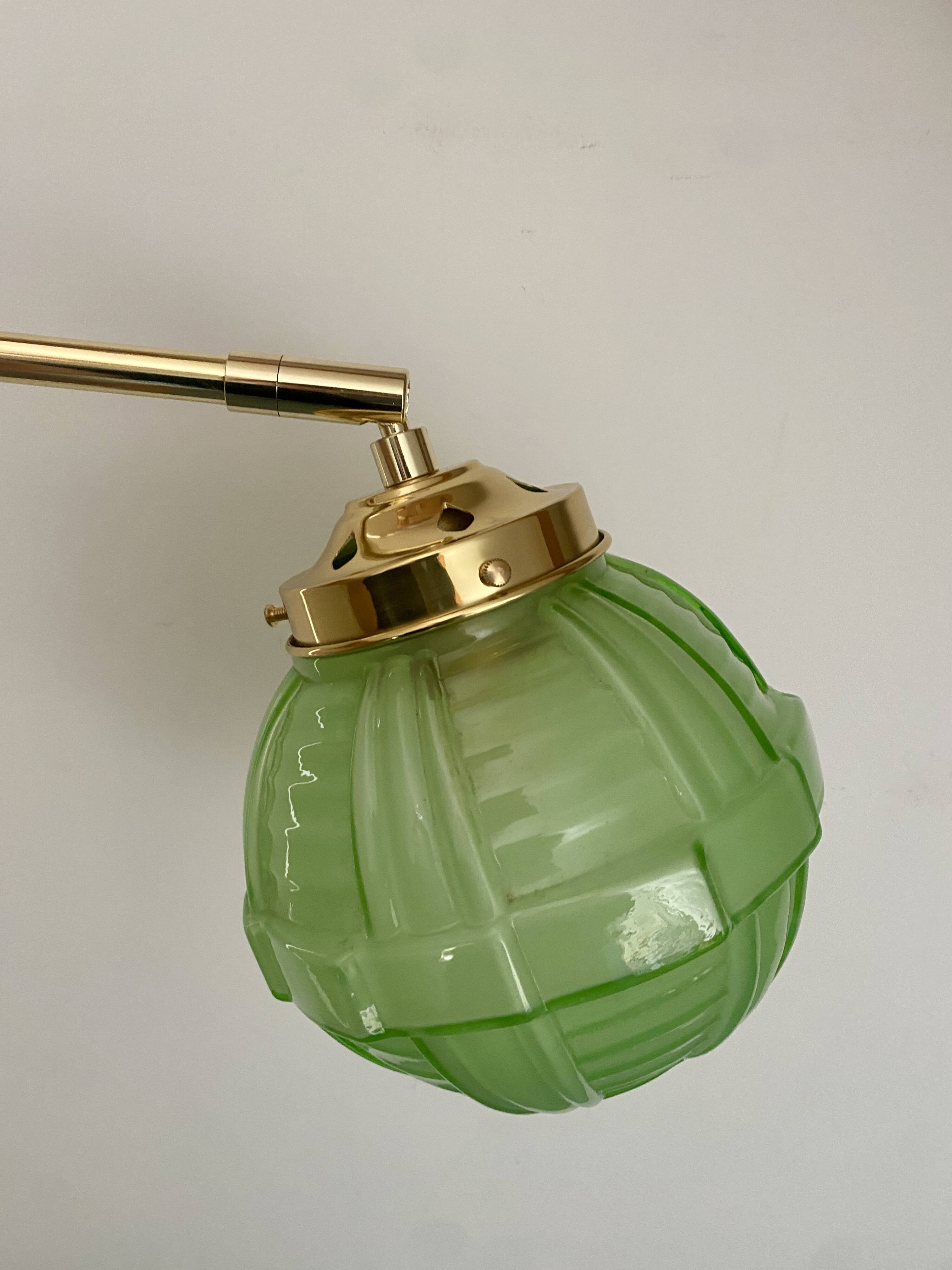 Vintage art deco globe wall light in green glass