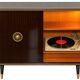 A vintage cabinet with a record player and a bar, 1960s.
