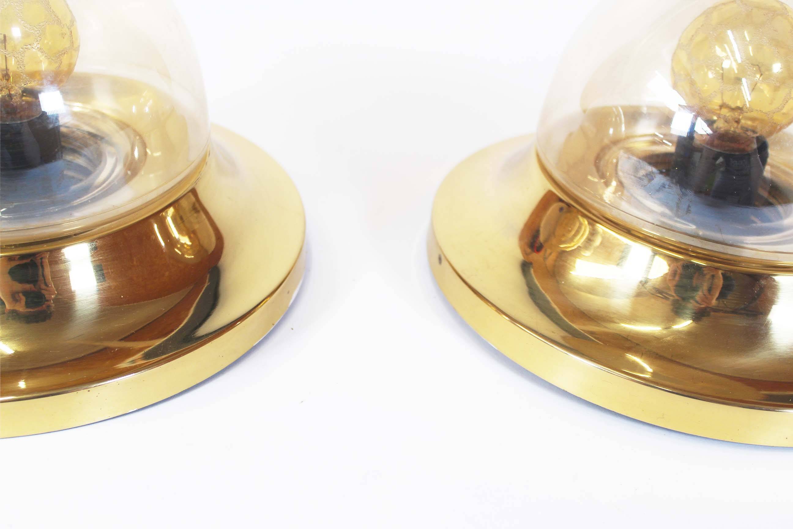 Pair of 1970’s petite brass & glass wall lights