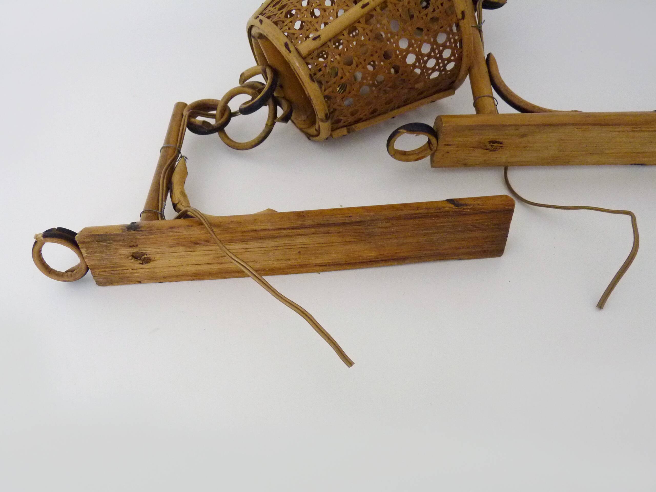 Pair of rattan and cane lantern wall lights. 1950s-1960s