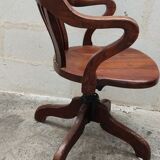 Old American office chair rounded around 1940 in oak