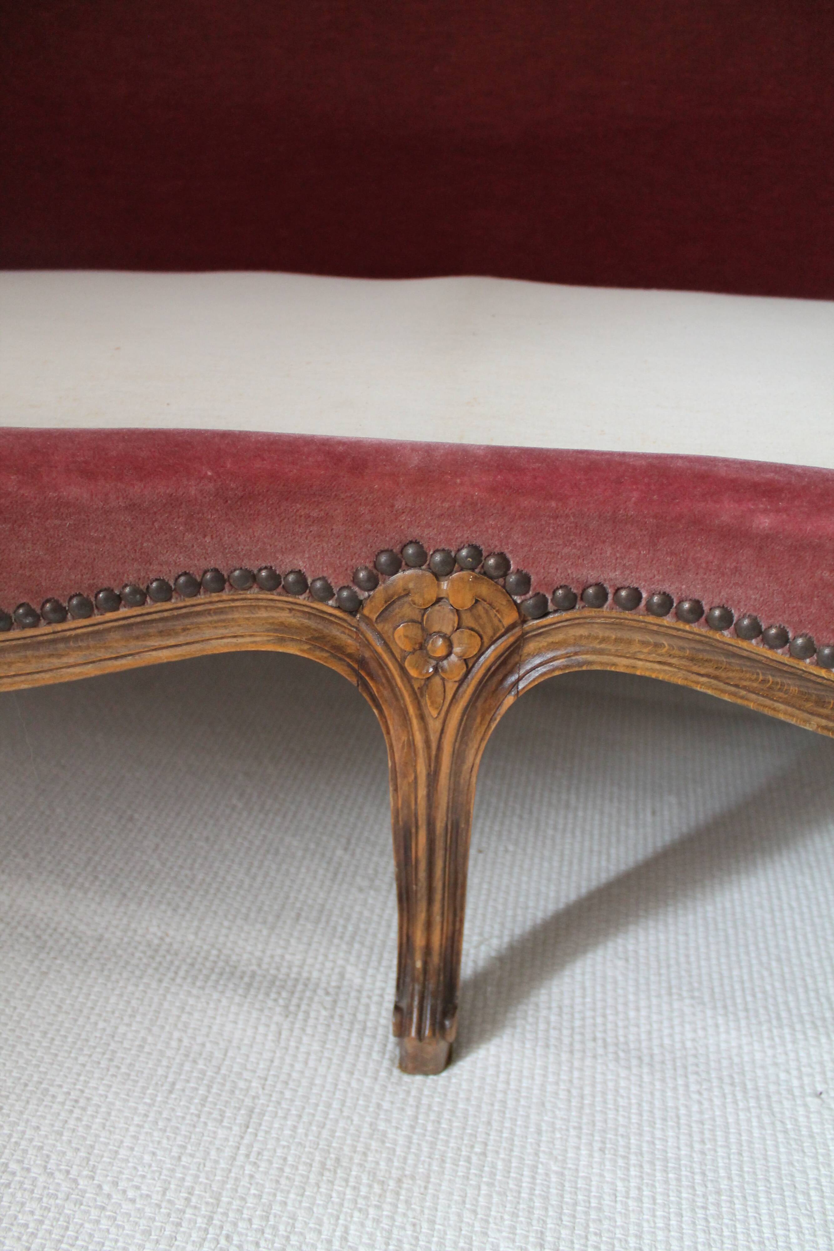 Faded pink velvet sofa