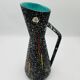 Vintage pitcher Hubert Bequet in speckled ceramic Belgium