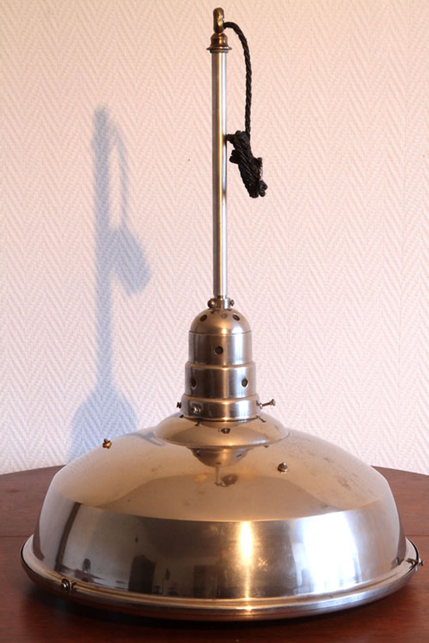 Old Bauhaus lamp in mercurized glass chrome industrial suspension.