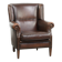 Subtle sheepskin wingback armchair with a deep cognac colour