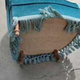 Blue velvet upholstered toad armchair