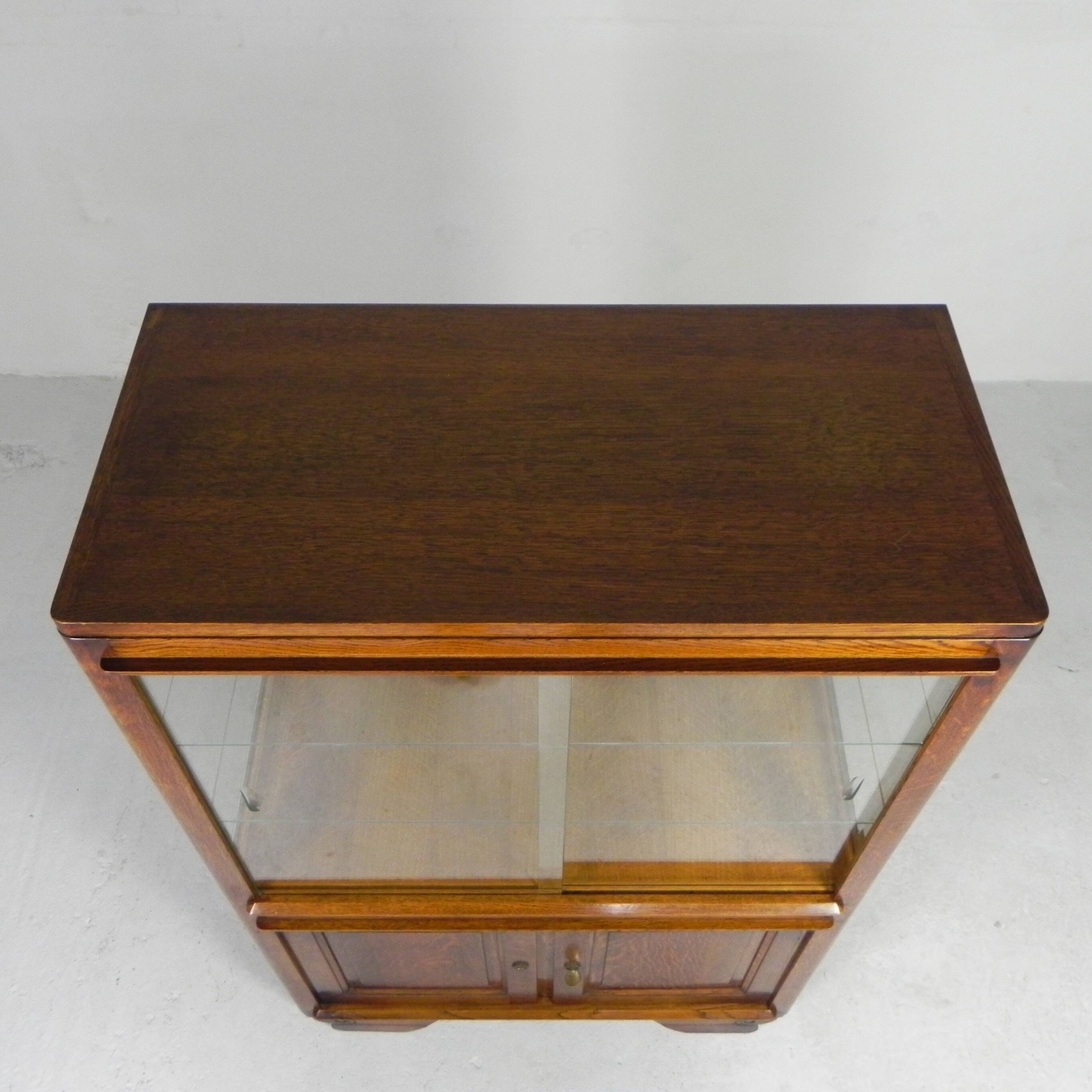 Art Deco display cabinet with sliding glass doors