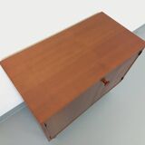Small vintage storage unit in modernist Scandinavian style in teak from the 60s