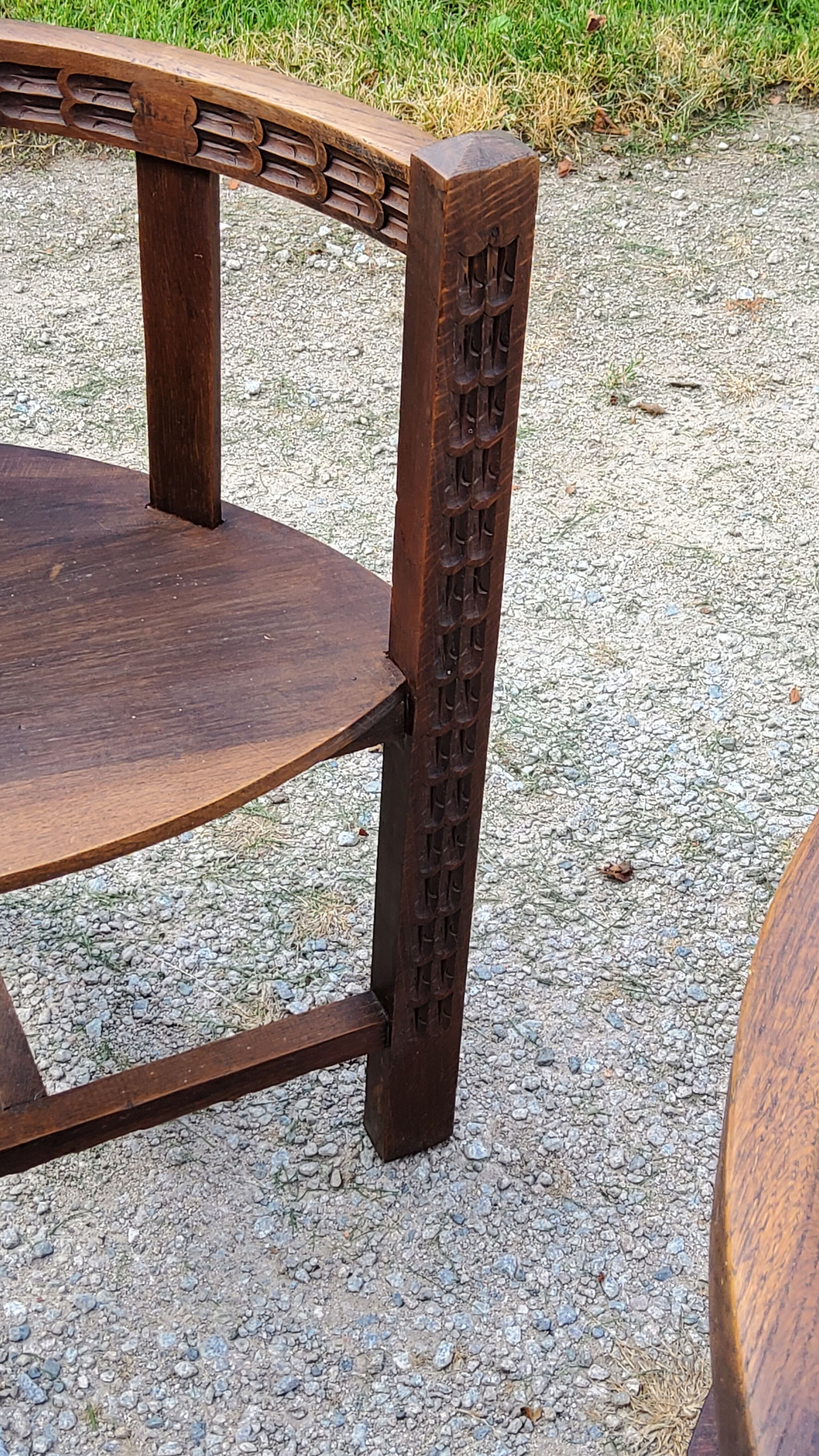 Set of three brutalist tripod armchairs in carved solid oak