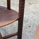 Set of three brutalist tripod armchairs in carved solid oak