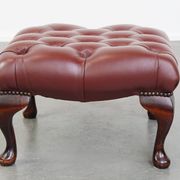 In very good condition elegant red/brown chesterfield ottoman made of cow leather